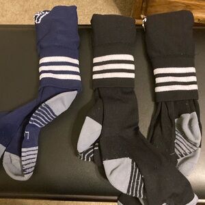 Three pairs of large soccer socks